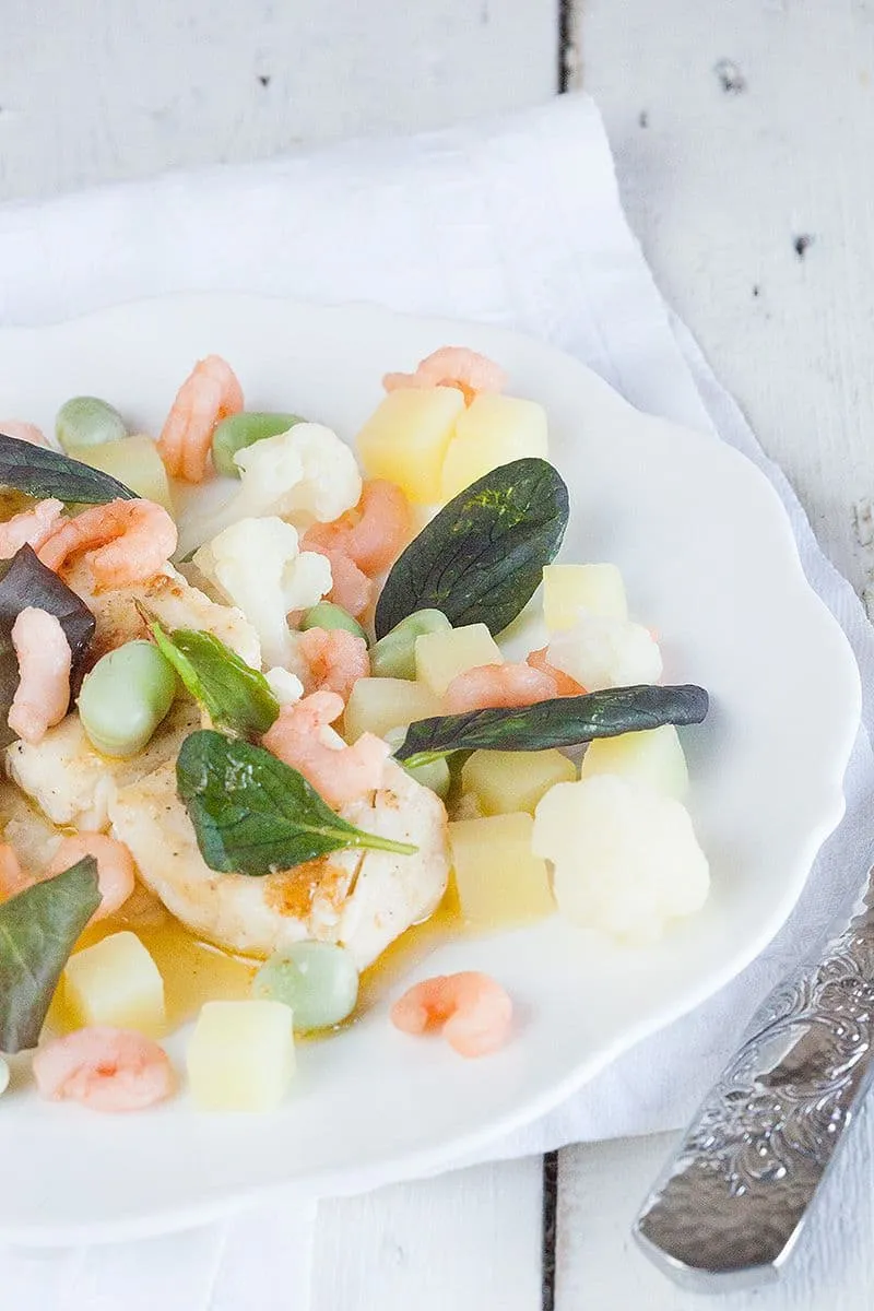 Kabeljauw met tuinbonen en bloemkool