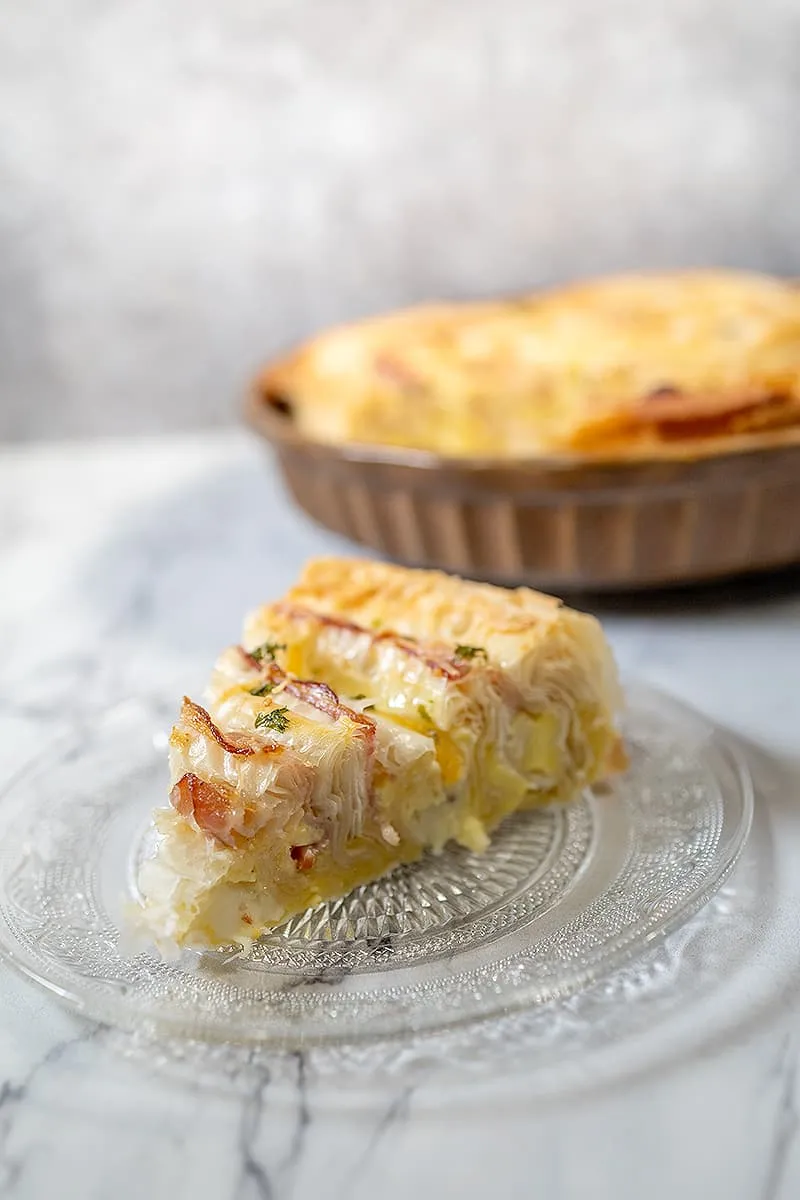 Raclette kaas quiche - extra krokante quiche met laagjes